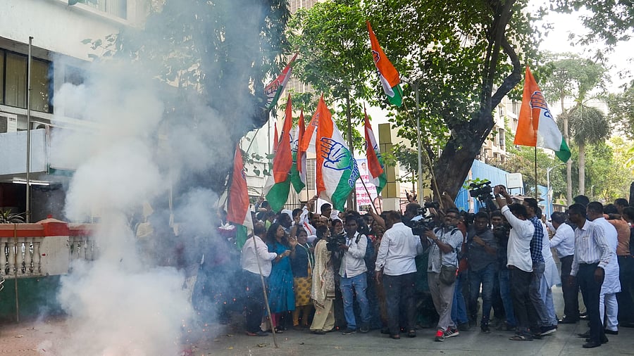 <div class="paragraphs"><p>Congress supporters celebrate the party's lead during counting of votes for Lok Sabha elections, in Mumbai, Tuesday, June 4, 2024.</p></div>