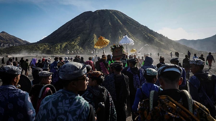 <div class="paragraphs"><p>Tenggerese Hindu worshippers carry offerings to purify in the Luhur Poten temple, ahead of the Yadnya Kasada festival at the Sea of Sands in Probolinggo, East Java, Indonesia, June 20, 2024. The festival has been held by the Tenggerese since the 13th century to express their devotion and gratitude to their ancestors and gods, thousands of people trek to the top of Mount Bromo (2,329m) and end their ritual by hurling offerings into the volcano's crater. "To respond to what the Almighty has conveyed through nature, the people must adapt and they should not forget to pray," said Suyitno, a Tenggerese spiritual leader.</p></div>