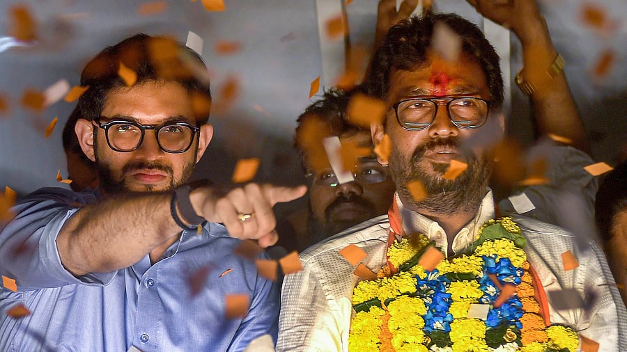 <div class="paragraphs"><p>Shiv Sena (UBT) leader Aaditya Thackeray with party's Mumbai North-West seat candidate Amol Kirtikar during a road show for Lok Sabha elections, in Mumbai, Tuesday, May 14, 2024.</p></div>