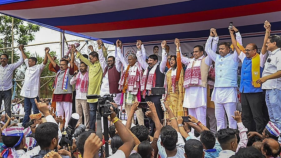 <div class="paragraphs"><p>Assam Minister and Asom Gana Parishad (AGP) President Atul Bora with candidate from Barpeta seat Phani Bhusan Choudhury and others during a public meeting before filing nomination for the Lok Sabha elections, in Barpeta district.</p></div>