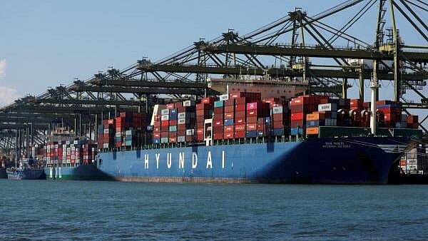 <div class="paragraphs"><p>Container ships are berthed at PSA's Pasir Panjang Terminal in Singapore.</p></div>