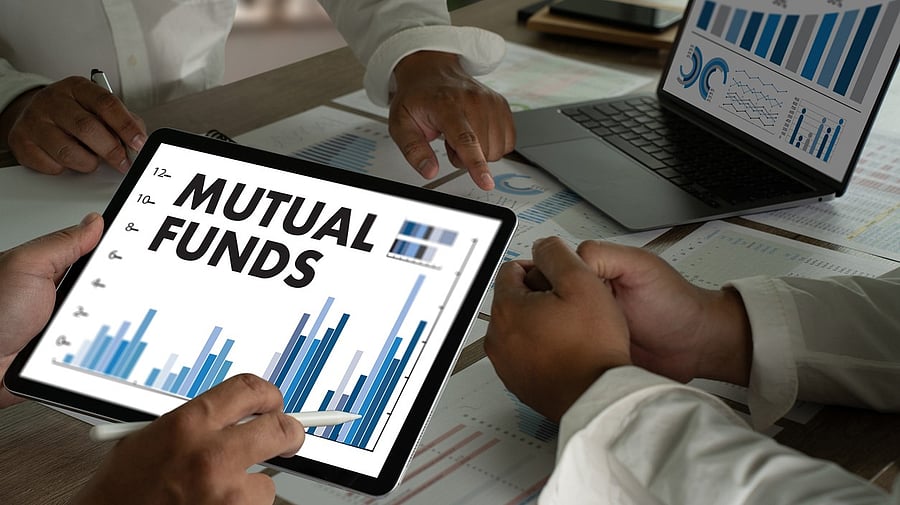 <div class="paragraphs"><p>Representative illustration showing tablets with the words 'Mutual Funds'.</p></div>