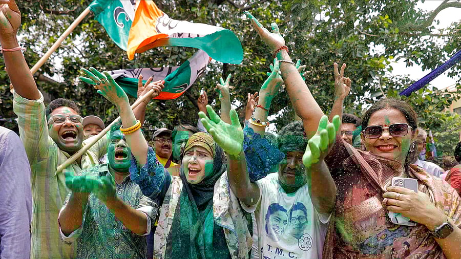 <div class="paragraphs"><p>TMC supporters celebrate as party leads in West Bengal.</p></div>