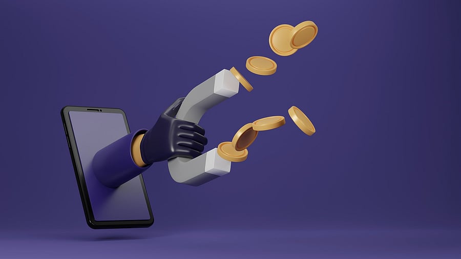 <div class="paragraphs"><p>Hacker hand holding a huge magnet attracts money through a cell phone in cyberspace. Cyber crime financial fraud. </p></div>