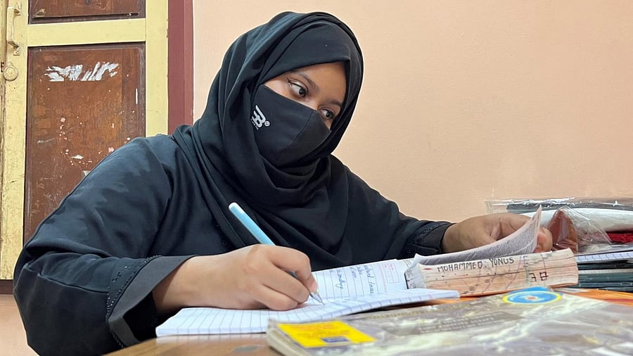 <div class="paragraphs"><p>A representative image showing a girl wearing a hijab.</p></div>