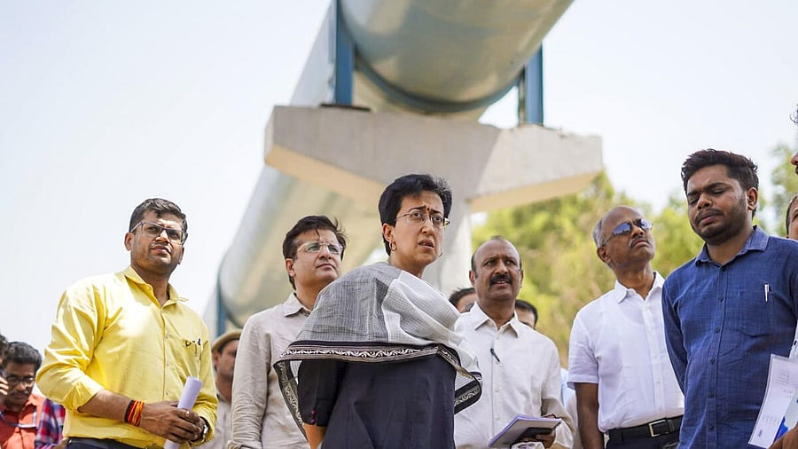 <div class="paragraphs"><p>Delhi Minister Atishi along with officials of Jal Board and Revenue Department, conducts inspection of pipeline network in view of the ongoing Delhi water crisis, in New Delhi.</p></div>