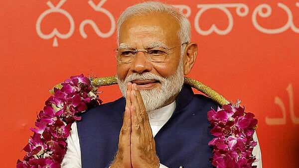 <div class="paragraphs"><p>Indian Prime Minister Narendra Modi gestures, at the Bharatiya Janata Party (BJP) headquarters in New Delhi.</p></div>