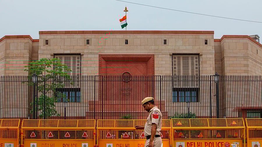 <div class="paragraphs"><p>A policeman stands guard outside the Parliament building.</p></div>