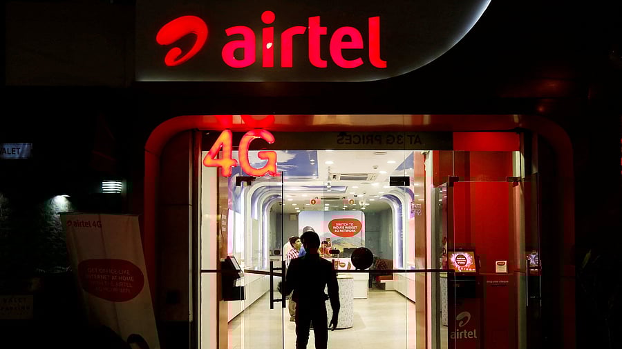 <div class="paragraphs"><p>A man leaves a Bharti Airtel store in New Delhi</p></div>