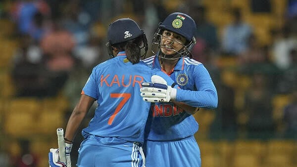 <div class="paragraphs"><p>Indian batter Smriti Mandhana with skipper Harmanpreet Kaur.</p></div>