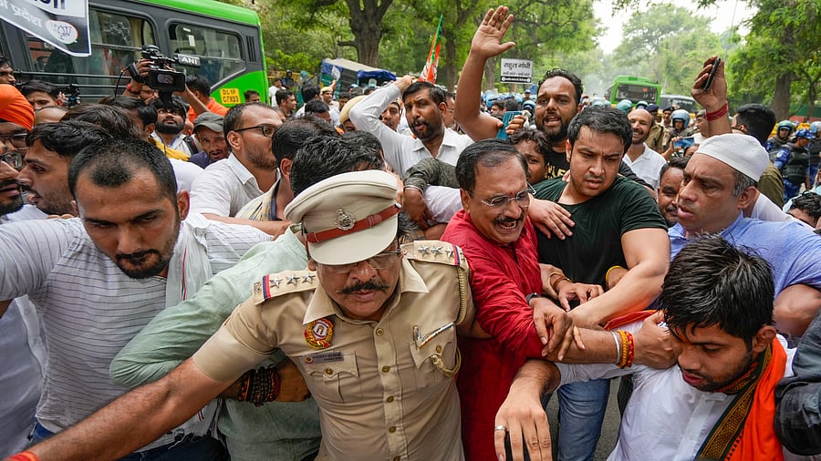 <div class="paragraphs"><p>Delhi BJP President Virendra Sachdeva being detained during a protest against Rahul Gandhi's recent speech in Parliament, July 3, 2024.</p></div>