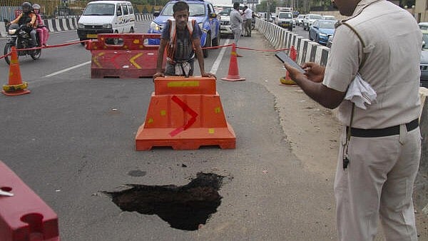 <div class="paragraphs"><p>Gurugram: A portion of the Gurugram-Sohna expressway caved in, near Subhash Chowk in Gurugram, Tuesday, July 2, 2024.</p></div>