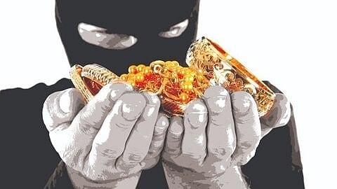 <div class="paragraphs"><p>A robber with stolen cash and jewellery  (Representative Image)&nbsp;</p></div>