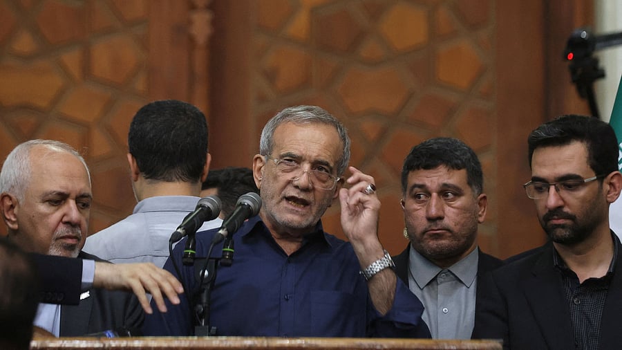 <div class="paragraphs"><p>New Iran president Masoud Pezeshkian (Centre).</p></div>