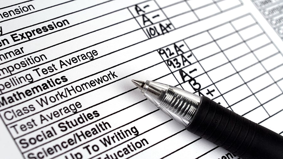 <div class="paragraphs"><p>Representative image of a report card.</p></div>