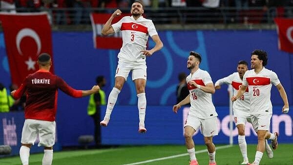 <div class="paragraphs"><p>Euro 2024: Turkey's Merih Demiral celebrates scoring their first goal with Ismail Yuksek and Ferdi Kadioglu in Round of 16 in the Austria v Turkey match in Leipzig, Germany on July 2, 2024</p></div>