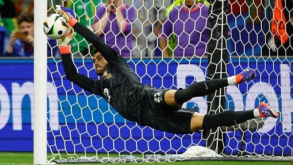 <div class="paragraphs"><p>Euro 2024 - Round of 16 - Portugal v Slovenia - Frankfurt Arena, Frankfurt, Germany - July 1, 2024 Portugal's Diogo Costa saves a penalty during the shootout missed by Slovenia's Jure Balkovec </p></div>