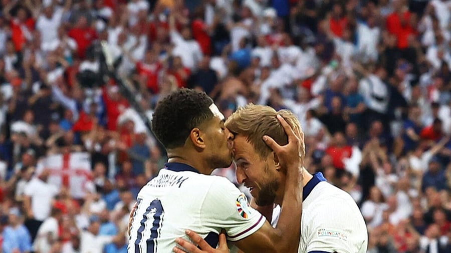 <div class="paragraphs"><p>England's Jude Bellingham celebrates scoring their first goal with Harry Kane.</p></div>