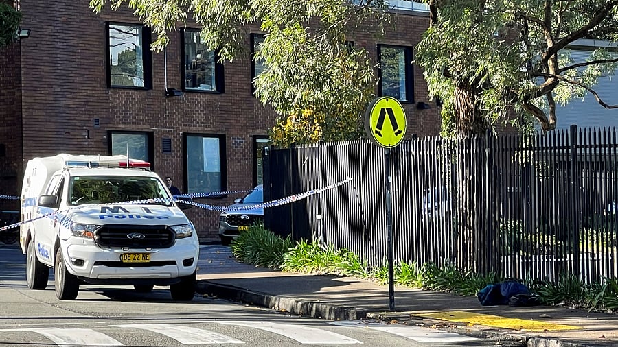 <div class="paragraphs"><p>A police vehicle is seen at the scene after a 14-year-old boy was arrested and a 22-year-old man was taken to hospital following a stabbing incident at the University of Sydney in Camperdown, Australia on July 2, 2024. </p></div>