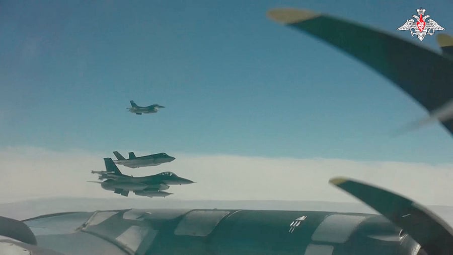 <div class="paragraphs"><p>US and Canadian jet fighters are seen next to a Russian TU-95 bomber as it conducts joint Russian and Chinese military plane patrols near the US state of Alaska, in this still image from a video released July 25, 2024. </p></div>