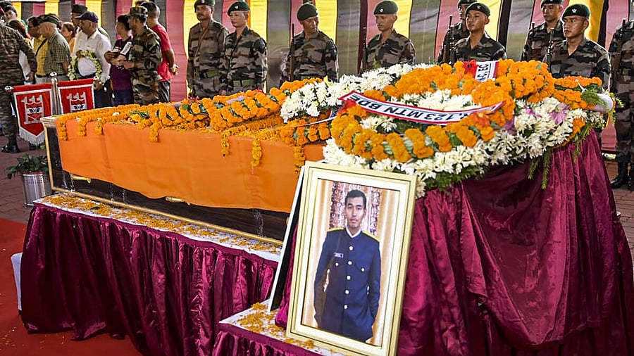 <div class="paragraphs"><p>A portrait of martyred Army captain Brijesh Thapa who was killed in a terrorist encounter in Jammu and Kashmir's Doda district, kept near his mortal remains.</p></div>