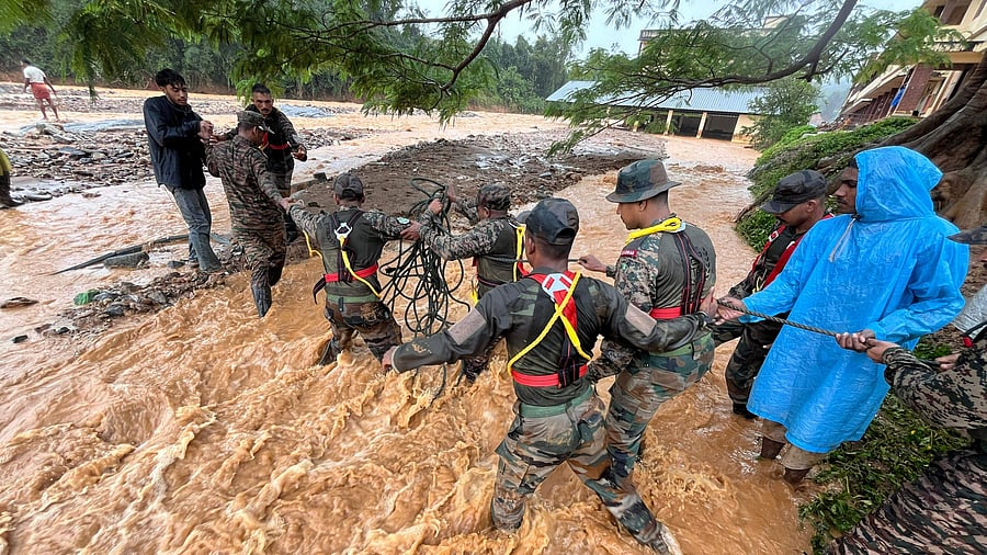 <div class="paragraphs"><p>Rescue operation underway following landslides triggered by heavy rain in the hilly areas of Wayanad district, Kerala, Tuesday, July 30, 2024. </p></div>