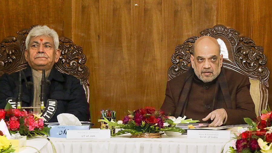 <div class="paragraphs"><p>Union Home Minister Amit Shah with Jammu and Kashmir Lieutenant Governor Manoj Sinha</p></div>