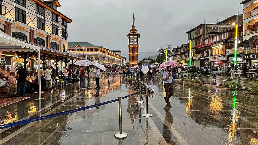<div class="paragraphs"><p>People at the newly-renovated historic Clock Tower, Lal Chowk.</p></div>