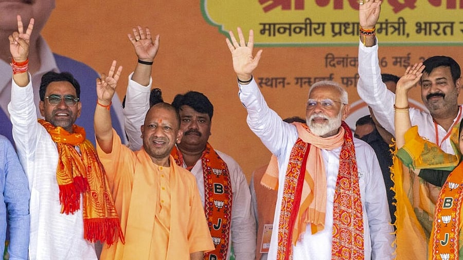 <div class="paragraphs"><p>File photo of Prime Minister Narendra Modi, Uttar Pradesh Chief Minister Yogi Adityanath during Lok Sabha polls in the state. </p></div>