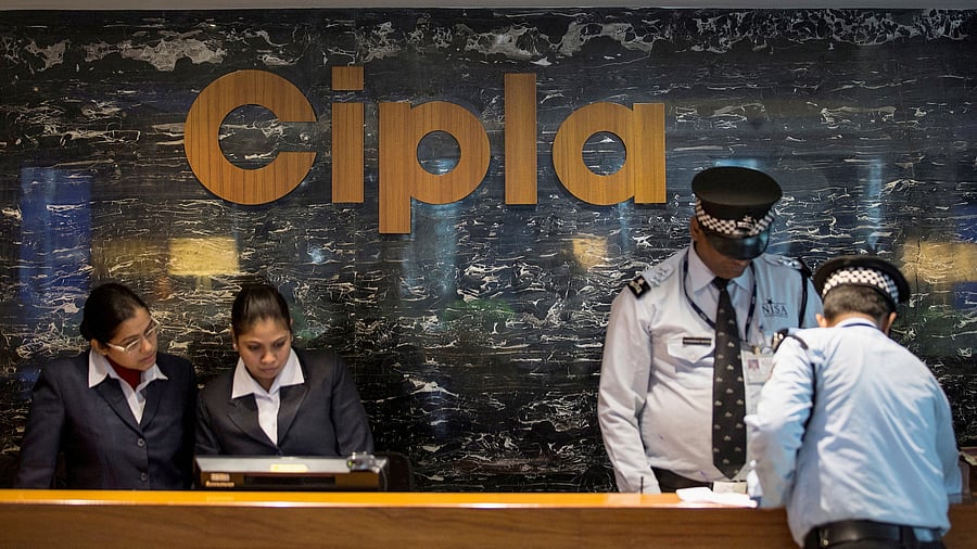<div class="paragraphs"><p>Employees and security staff at the reception area of Cipla at its Bengaluru facility.</p></div>