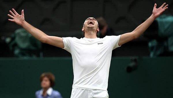 <div class="paragraphs"><p>Wimbledon - All England Lawn Tennis and Croquet Club, London, Britain - Taylor Fritz of the US celebrates after winning his fourth round match against Germany's Alexander Zverev.</p></div>