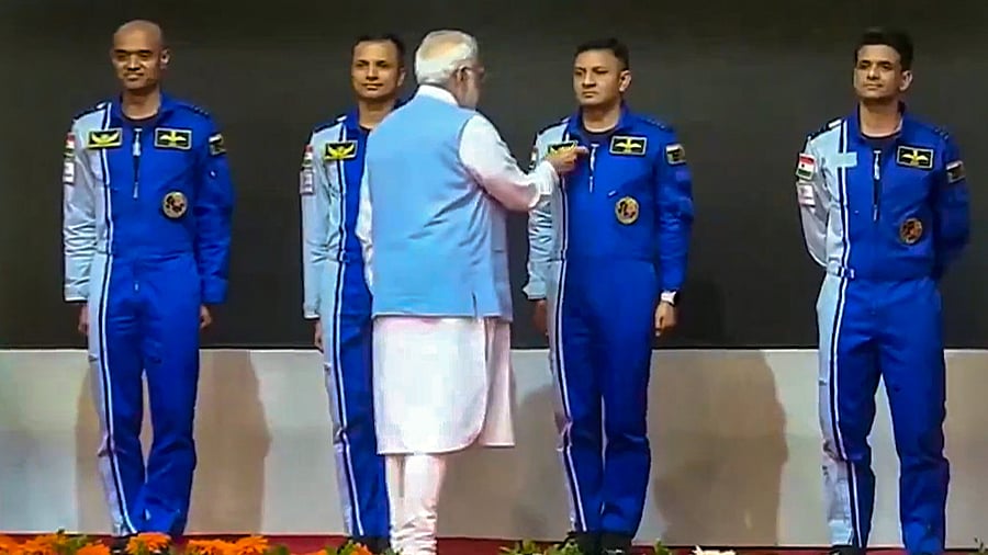 <div class="paragraphs"><p>Prime Minister Narendra Modi hands-over wings to astronauts-designate Shubanshu Shukla, Prashanth Balakrishnan Nair, Angad Prathap and Ajit Krishnan who have been selected to be the astronauts on India's first crewed mission to space 'Gaganyaan Mission', at the Vikram Sarabhai Space Centre (VSSC), in Thiruvananthapuram, Tuesday, Feb. 27, 2024. </p></div>