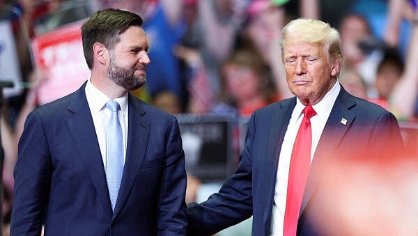 <div class="paragraphs"><p>Republican presidential nominee and former US President Donald Trump stands with Republican vice presidential nominee US Senator J.D. Vance (R-OH).</p></div>