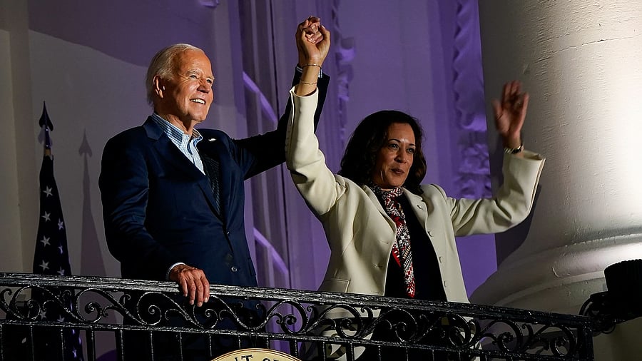 <div class="paragraphs"><p>US President Joe Biden and Vice President Kamala Harris raise their hands during Independence Day celebration in Washington, US.</p></div>
