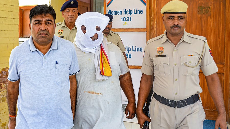 <div class="paragraphs"><p>File Photo of Bittu Bajrangi, accused in Nuh violence case, being produced at a court following his arrest, in Nuh</p></div>