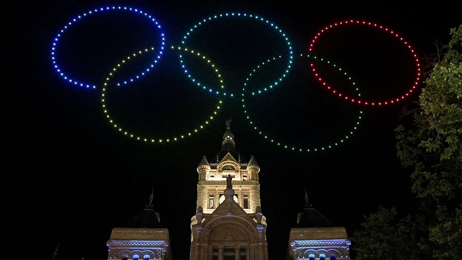 <div class="paragraphs"><p>Drones form the olympic rings, over the Salt Lake City and County Building, during a show, as people celebrate the announcement that Salt Lake City is officially awarded the rights to host the 2034 Winter Olympic and Paralympic Games, in Salt Lake City, Utah, US, July 24, 2024.</p></div>