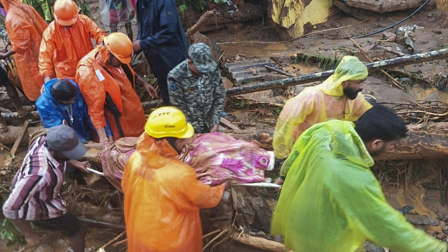 <div class="paragraphs"><p>National Disaster Response Force (NDRF) personnel conduct rescue operation after landslides in the hilly areas near Meppadi, in Wayanad district, Kerala, Tuesday, July 30, 2024. At least 23 people were killed and several are feared trapped, according to officials.</p></div>
