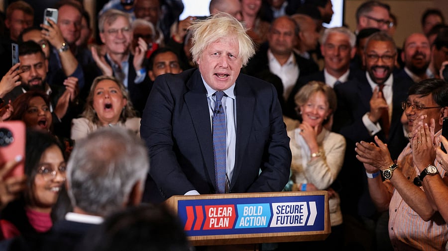 <div class="paragraphs"><p>Former British Prime Minister Boris Johnson is applauded as he arrives to speak during a Conservative general election campaign event in London, Britain.</p></div>
