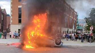 <div class="paragraphs"><p>A car burns during anti-immigration demonstrations in Sunderland, Britain.</p></div>