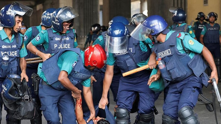 <div class="paragraphs"><p>File photo of police personnel carrying a wounded cop during a clash between police, pro-government supporters and protesters. </p></div>