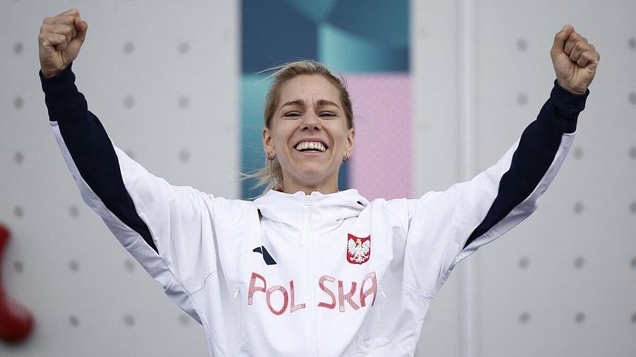<div class="paragraphs"><p>Gold medallist Aleksandra Miroslaw celebrates on the podium.</p></div>