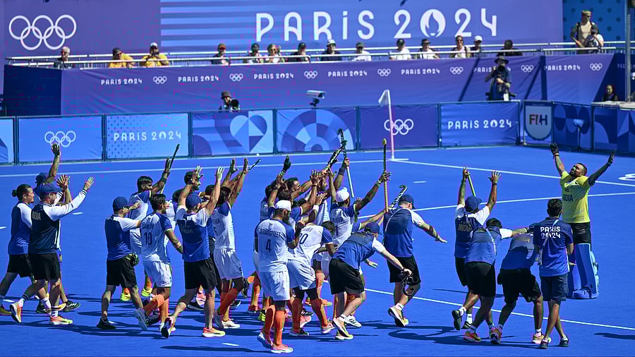 <div class="paragraphs"><p>PR Sreejesh celebrates the Indian win with team-mates</p></div>