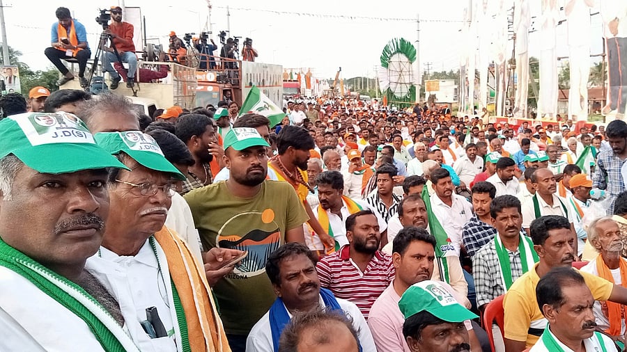 BJP and JD(S) workers take part in the padayatra at Srirangapatna in Mandya district on Thursday.