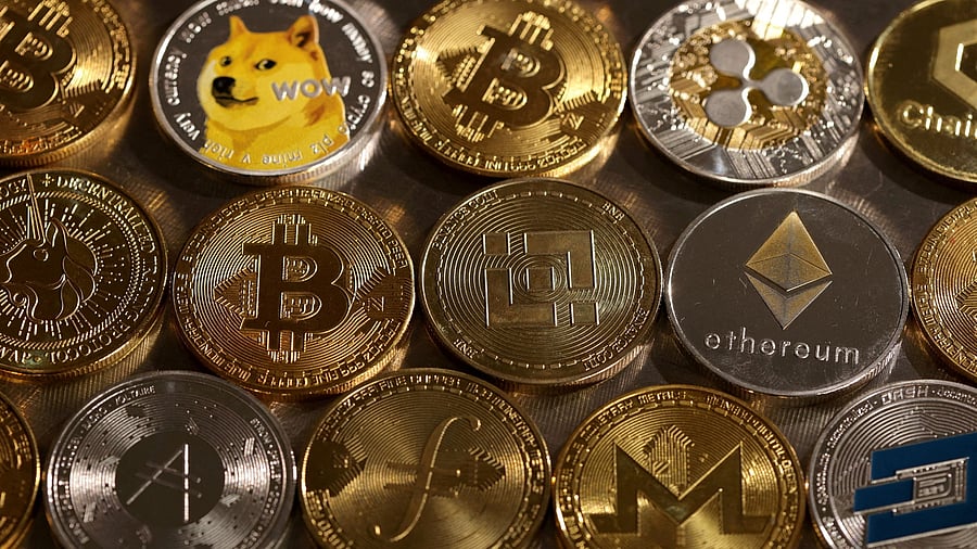 <div class="paragraphs"><p>Representations of cryptocurrencies are seen in this illustration</p></div>