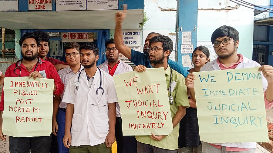 <div class="paragraphs"><p>Junior doctors and medical students stage a protest outside North Bengal Medical College and Hospital (NBMC&H) against the sexual assault and murder of a postgraduate trainee doctor in RG Kar Medical College & Hospital, in Kolkata.</p></div>
