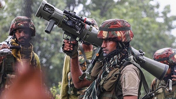 <div class="paragraphs"><p>Representative image showing army personnel with a weapon in J&K's Doda.</p></div>