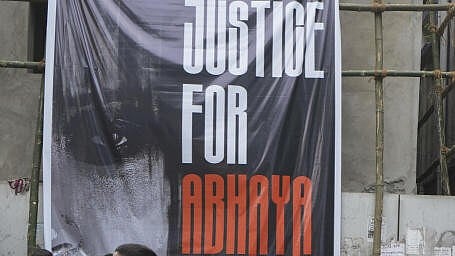 <div class="paragraphs"><p>Poster hung outside the R G Kar Medical College and Hospital after miscreants vandalised an emergency ward of the hospital, in Kolkata, Thursday, Aug. 15, 2024.</p></div>