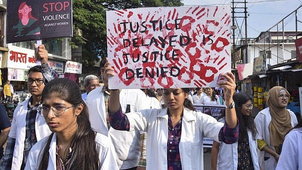 <div class="paragraphs"><p>Members of Indian Medical Association (IMA) take part in a protest march against the alleged sexual assault and murder of a postgraduate trainee doctor in Kolkata, in Karad. </p></div>