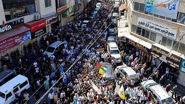 <div class="paragraphs"><p>Funeral of a Palestinian killed in an Israeli raid, in Dura near Hebron.</p></div>