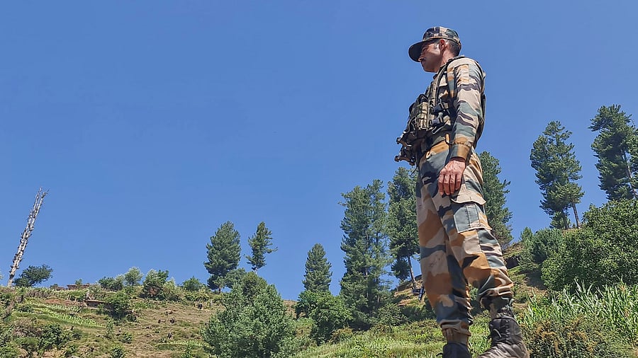 <div class="paragraphs"><p>A security personnel stands guard in Jammu and Kashmir. (Representative image)</p></div>